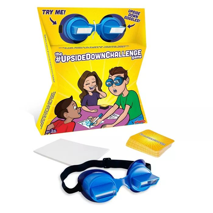 a pair of blue goggles sitting in front of a box with two children's glasses