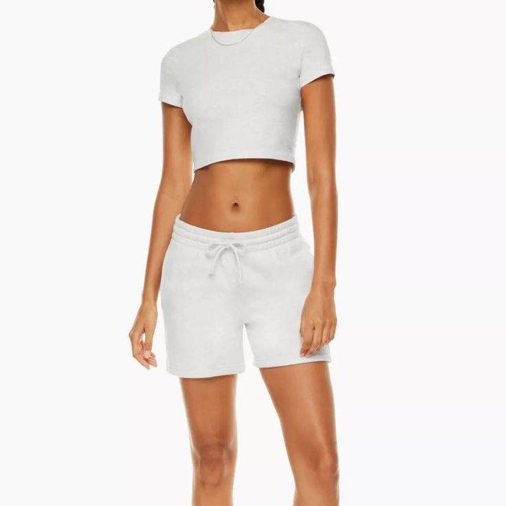 Cozy Fleece Boyfriend Mid-Thigh Sweat Shorts From Aritzia Tna New With Tags (Nwt) In The Color “Heather Cloud White” Has A Drawstring Waistband & Pockets Mid To High Waisted Tag Says Size 2xs Laying Flat, Waist = 12.5” Length = 14.5” Rise = 9” Inseam = 5” Great Quality & Perfect For Fall Or Winter Time! *1st Pic Is The Model Pic. The Rest Are My Pics Tags: Soft Comfy Lounge Athleisure Sporty Loungewear Streetwear Casual Lounge Athleisure, Sporty Loungewear, Aritzia Tna, Comfy Lounge, Streetwear Casual, My Pics, Cloud White, Sweat Shorts, Drawstring Waistband