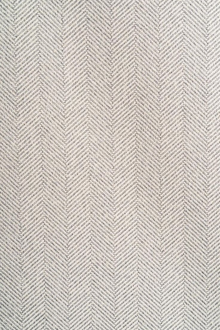 an upholstered white and grey herringbone fabric