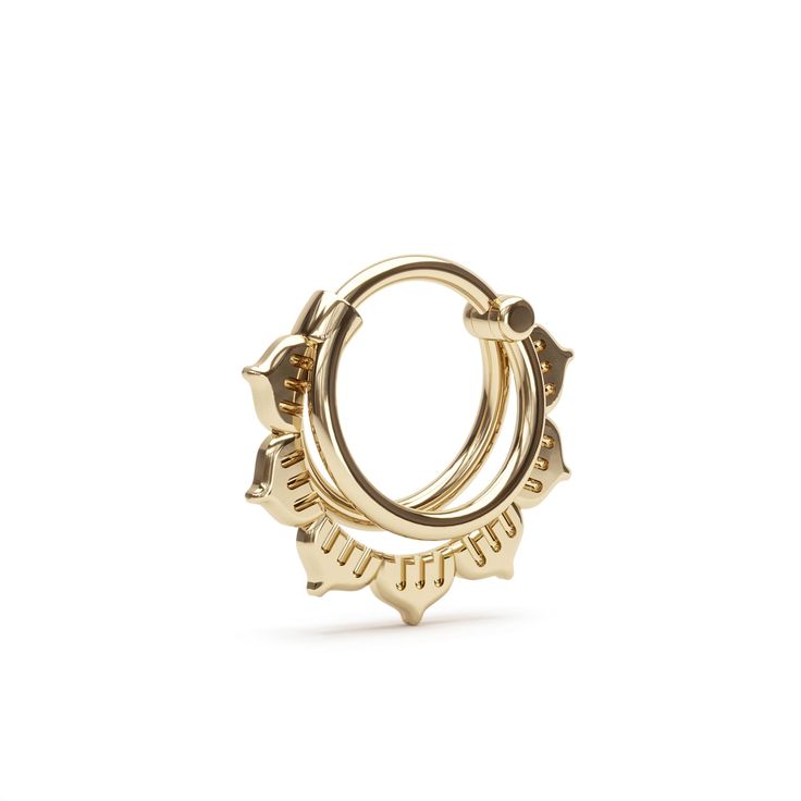 a pair of gold hoop earrings with small stars on each side and an open circle