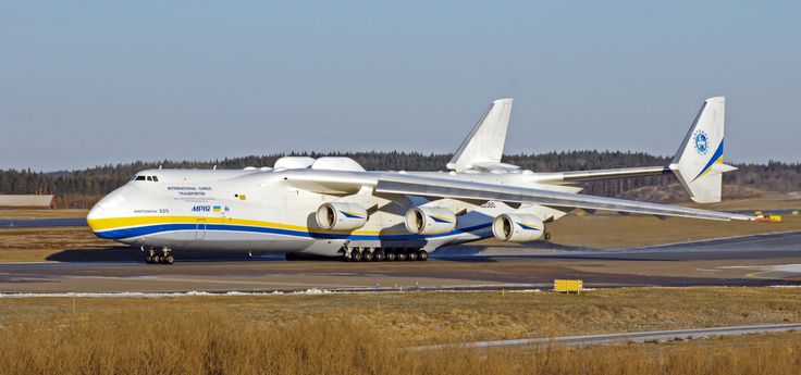 an airplane is sitting on the tarmac with it's landing gear down and its wheels out