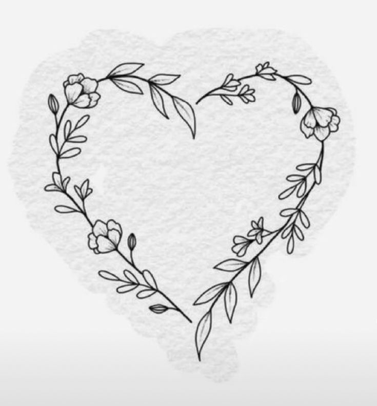 a heart shaped frame with flowers and leaves on the side, drawn in black ink