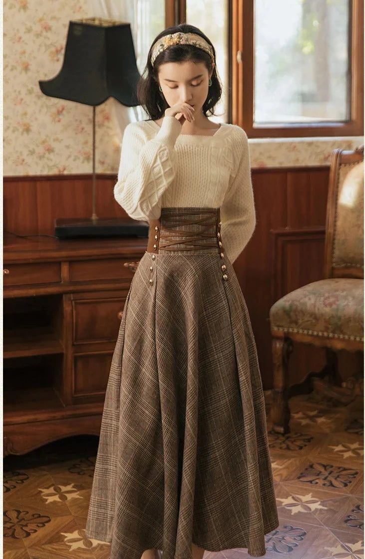 Indulge in the timeless and sophisticated style of Calling The Fog Dark Academia 2-piece set. Featuring a lace-up high waist skirt crafted from soft wool and a soft knitted sweater, this set will keep you warm during the colder months while elevating your look with its classic plaid pattern. Perfect for daydreaming in the cozy embrace of winter. Sweater One Size S/M/L Bust: 90-110cm Length: 53cm Skirt size S Waist: 62-68cm Length: 83cm Skirt size M Waist: 66-72cm Length: 84cm Skirt size L Waist: Dark Academia Outfits, Mode Hijabi, Academia Outfits, Academia Style, Academia Fashion, High Waist Skirt, The Fog, Moda Vintage, Dress Set