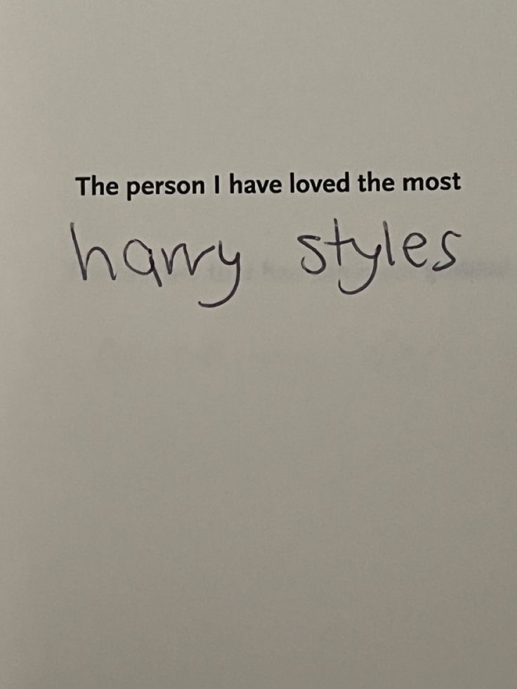 the person i have loved the most harry styles is written on a white piece of paper