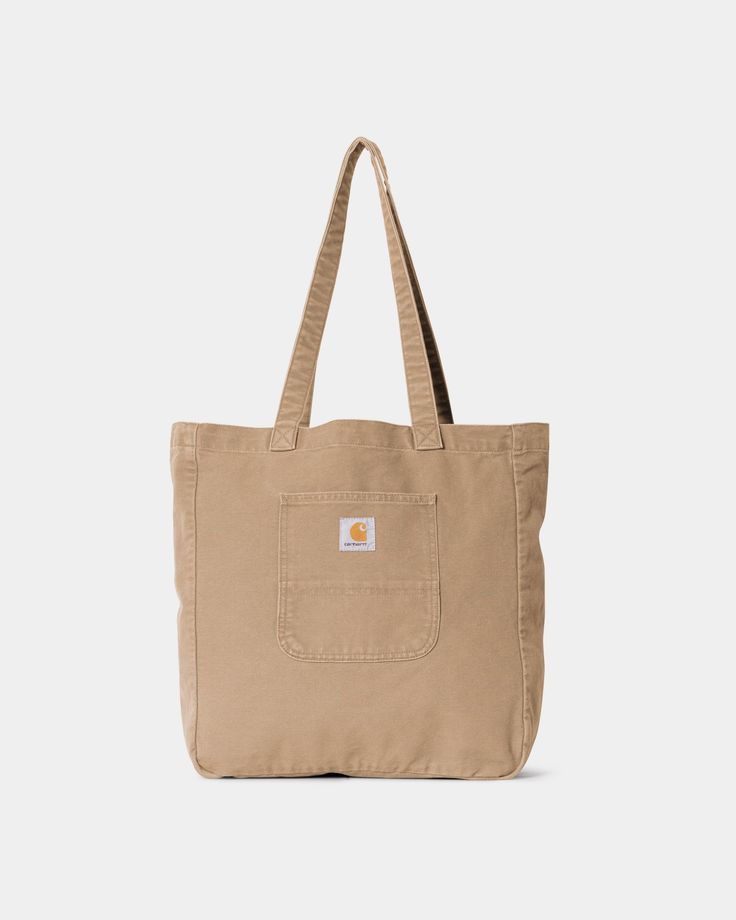 Color: Peanut - The Bayfield Tote is made from 12 oz Dearborn Canvas, which is a robust organic cotton fabric that will soften with wear over time. It has also undergone a 'faded' treatment, leaving it with a washed yet saturated appearance and rendering the woven Square Label murky in the process. The bag fastens with a snap-button closure and features a pocket on the outside, as well as a zipped pocket on the inside. _* 100% Organic Cotton 'Dearborn' Canvas, 12 oz, 40 x 38 x 13 cm / 15.7 x 15 Clarks Wallabees, Carhartt Work In Progress, Vans Off The Wall, Nudie Jeans, Clarks Originals, Organic Cotton Fabric, Carhartt Wip, Pocket Square, Family Shirts