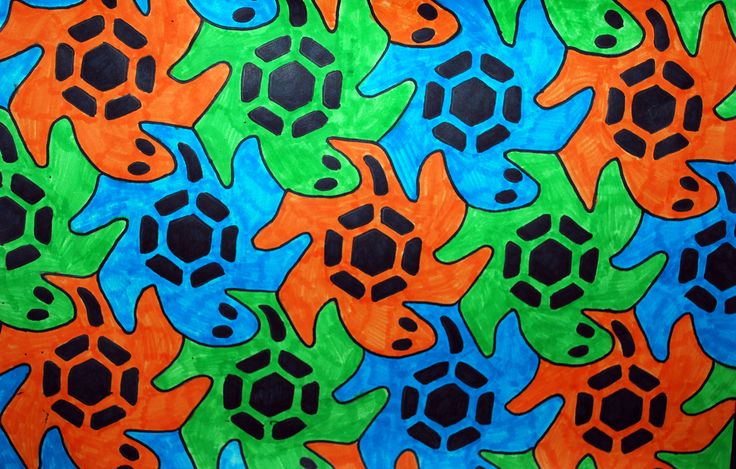 an art project with different colors and designs on the surface, including turtle shaped shapes