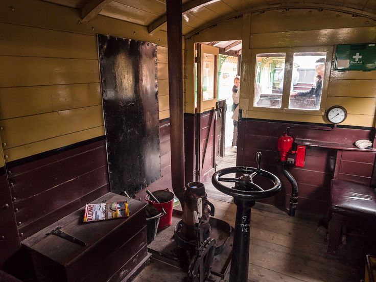 the inside of an old fashioned train car