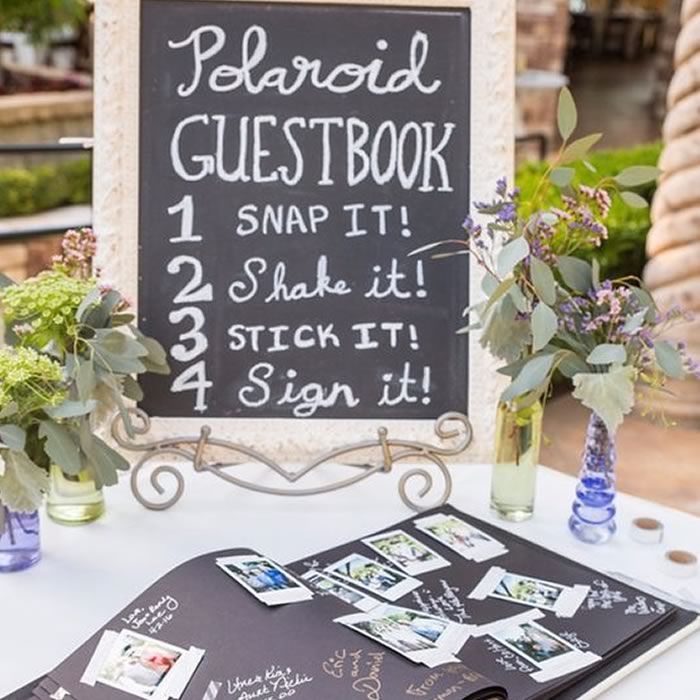 the wedding guest book is displayed on an iphone