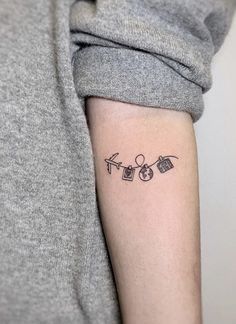 a person with a small tattoo on their arm