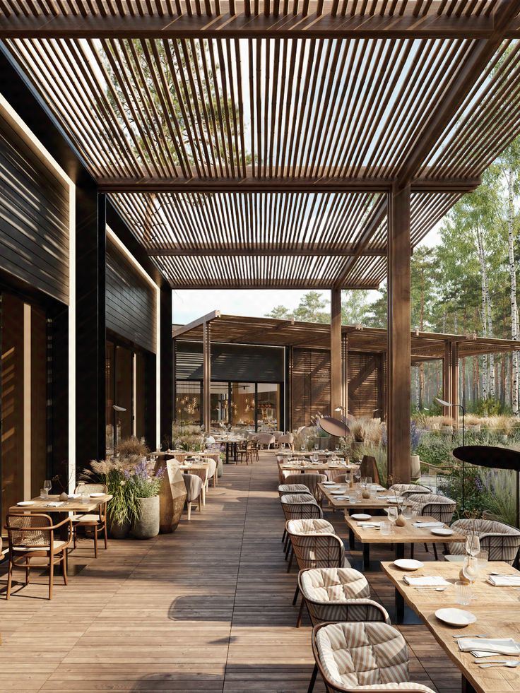 an outdoor dining area with tables and chairs