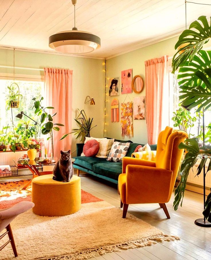 a living room filled with furniture and lots of plants