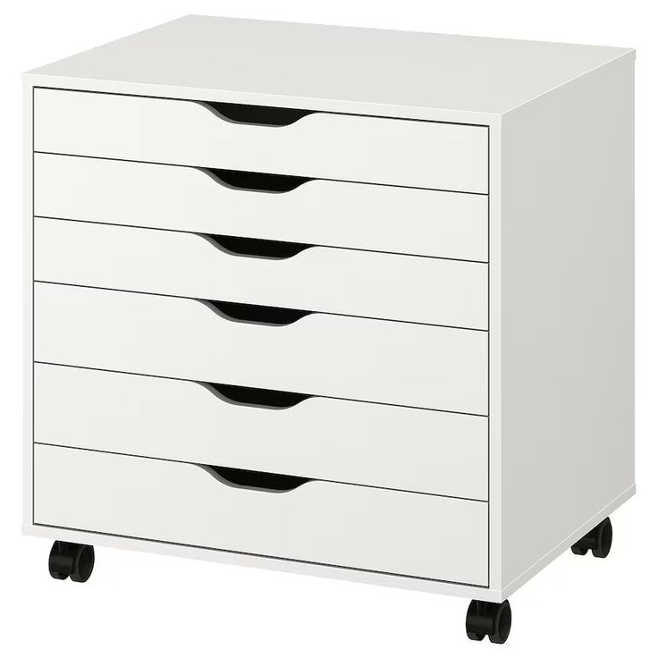 a white cabinet with five drawers and four black handles on casteors, isolated against a white background