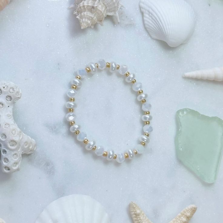 White Sands Bracelet | Coastal Beads by Rebecca Coastal Beads by Rebecca Faceted Glass, White Sand, Stretch Bracelet, Gold Beads, Business Ideas, Stretch Bracelets, Glass Beads, Everyday Wear, Bracelet