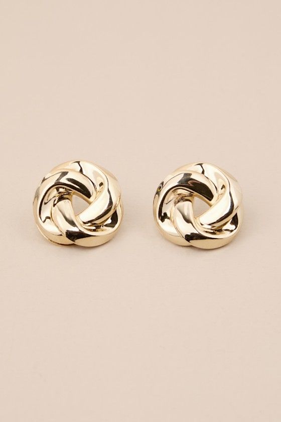 From going-out dresses to everyday outfits, the Lulus Shining Standard Gold Twisted Circle Stud Earrings are an easy way to elevate your outfit! Shiny, gold-toned metal shapes these stunning earrings that have a round design, with a knot-like, twisted effect that creates an ultra-elevated vibe. Post backs. 1" Diameter. 100% Steel. Imported. Lulus | Shining Standard Gold Twisted Circle Stud Earrings. Elevate Your Outfit, Circle Stud Earrings, Circle Earrings Studs, Circle Studs, Round Stud Earrings, Round Design, Stunning Earrings, Going Out Dresses, Party Accessories