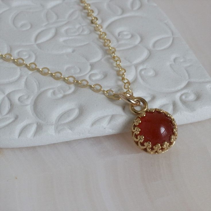 "* Beautiful Carnelian (8mm) pendant set in a gold plated bezel and complimented with a gold-filled chain in 16\", 18\", or 20\" lengths. Each necklace may vary and have it's own individual coloring and no two will look alike. * The Carnelian properties are said to promote positive life choices, give courage, motivate for success, leadership, and dispels apathy. * This Carnelian pendant has an open back. * This Carnelian necklace is a limited item. * Love Carnelian ~ * Single Point Carnelian Nec Carnelian Properties, Bead Diy, Carnelian Jewelry, Carnelian Crystal, Carnelian Necklace, Carnelian Pendant, Bracelet Minimalist, Carnelian Ring, Reddish Orange