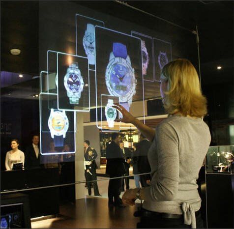 a woman is looking at watches on display