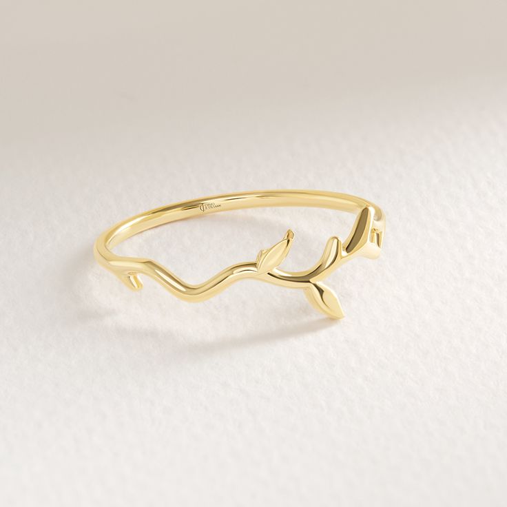 Here's 14K Gold Tree Leaf Stacking Band for Female. Plant Shaped Stacked Ring will be perfect comfort fitting ring for Her, Girlfriend and wife! We can create Twig Everyday Ring will be best gift for your bestfriend or girlfriend as well! This Dainty Simple Ivy Ring is great shower in her birthday or special night shower ring!  With this Leaf Shaped Ring can be switched with her birthday excellent keepsake. This Delicate Dainty Simple Ring has symbolizing your everlasting love & serves as a perf Gold Adjustable Nature-inspired Rings, Nature-inspired Gold Stackable Promise Rings, Gold Nature-inspired Stackable Promise Rings, Gifts For Your Bestfriend, Stackable Gold Rings, Ivy Ring, Printable Ring Sizer, Shower Rings, Gold Rings Stackable