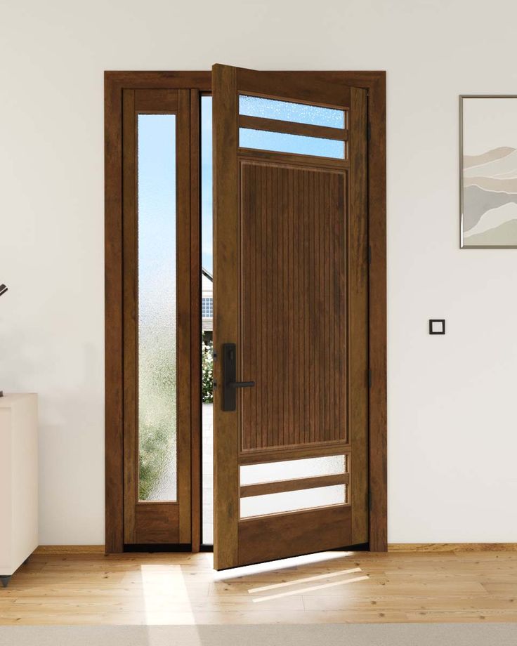 an open wooden door in a white room