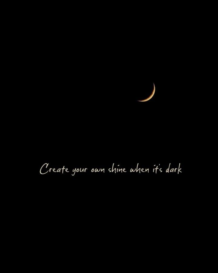 a black background with a half moon and the words create your own shine when it's dark