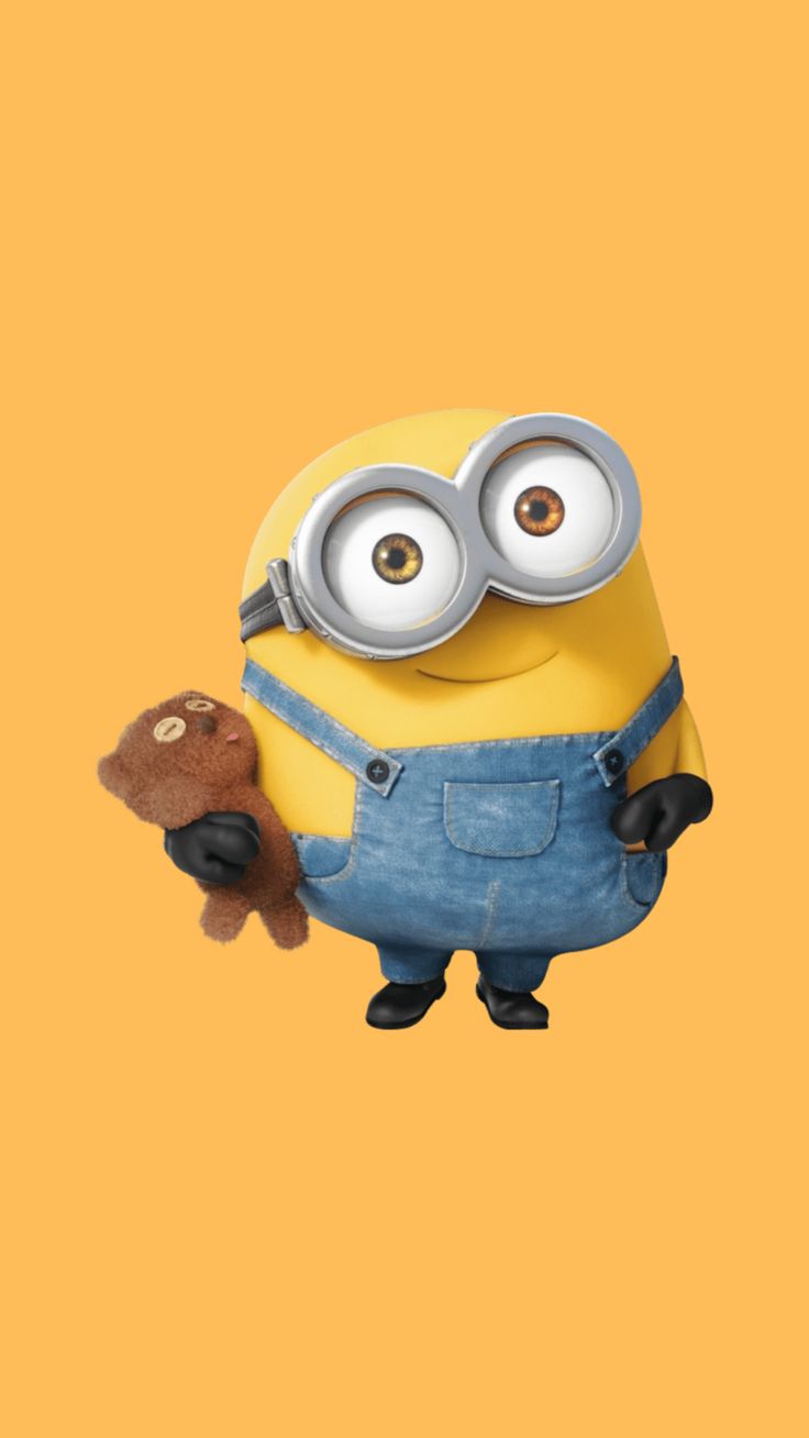 a minion holding a teddy bear in front of an orange background