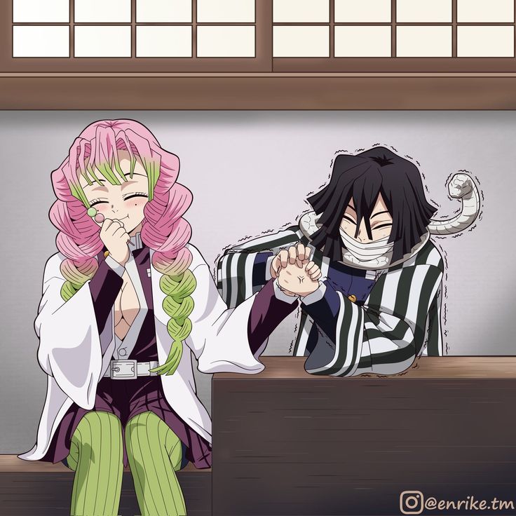 two anime characters sitting at a table in front of a window, one with pink hair and the other wearing green pants