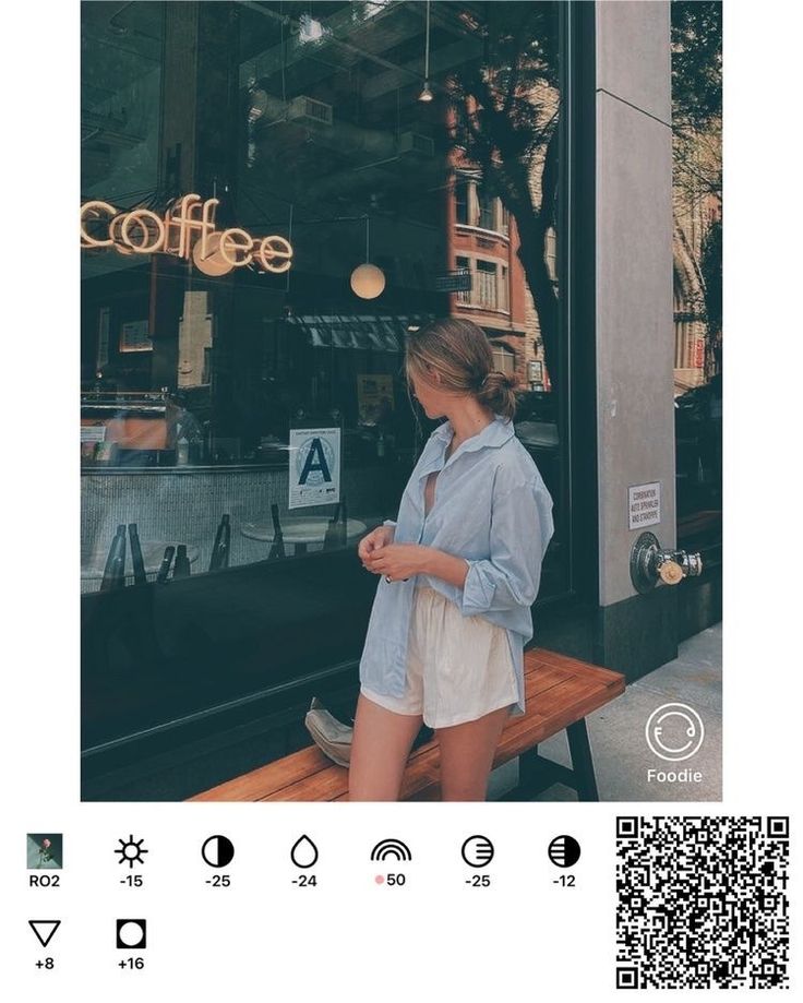 a woman standing in front of a coffee shop