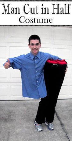 a man is holding up his shirt in front of a garage door with the words man cut in half costume