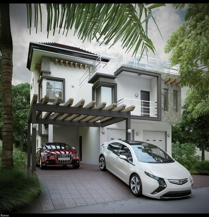 two cars parked in front of a house