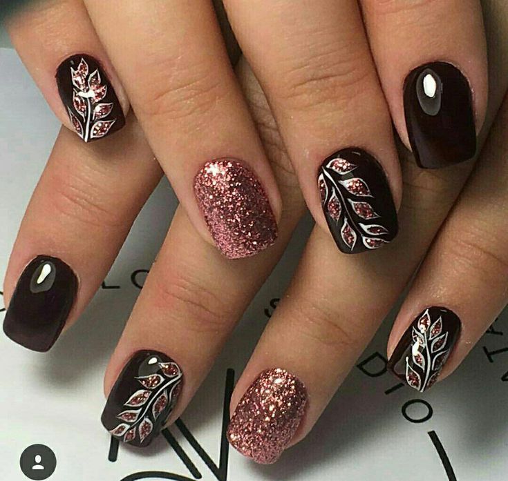 Black Nails with Rose Colored Leaves #fingernailart Black Nails With Colored Glitter, Nails With Roses Design, Black Gel Nail Designs, Pretty Black Nail Designs, Nail Designs With Leaves, Black Fall Nails Designs, Nail Art Leaves, Leaves On Nails, Black Fall Nails