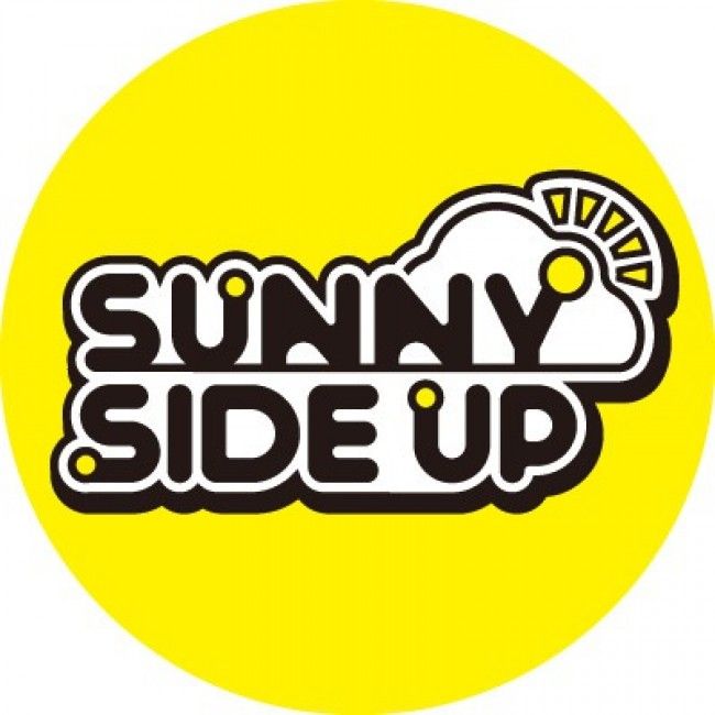 the sunny side up logo in black and white on a yellow circle with an orange background