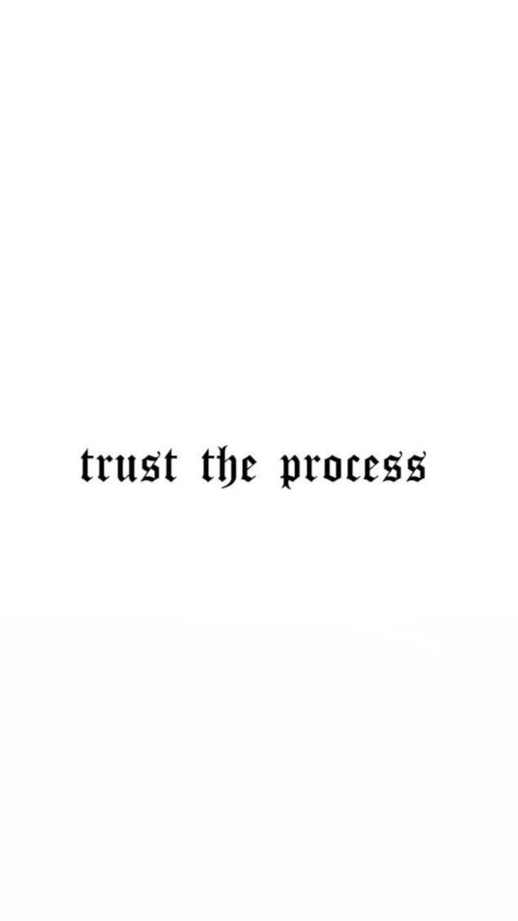 the words trust the process are in black and white