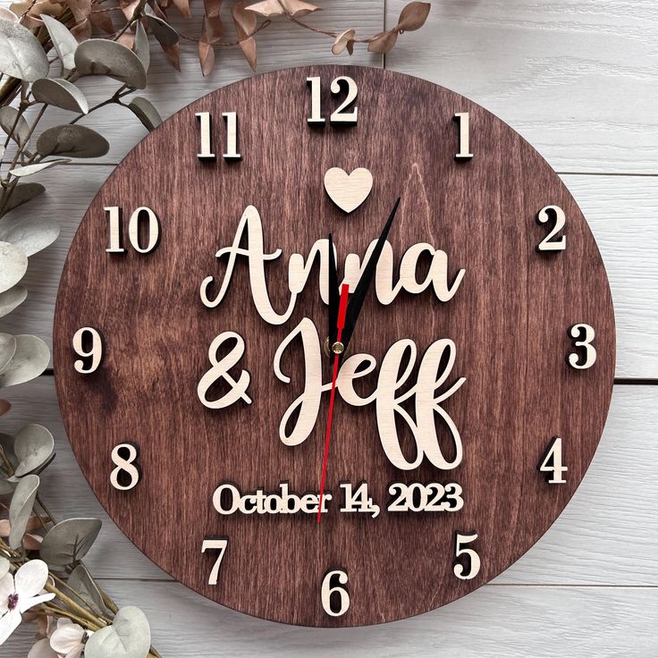 Add a personal touch to your home with this family name clock, a beautifully crafted large rustic wooden clock perfect for farmhouse-style decor. This personalized farmhouse wall clock features your family name, making it a meaningful centerpiece for any room. Its timeless design blends rustic charm with practicality, making it an ideal housewarming gift or a thoughtful gift for a couple. Either for your own home or as a special present, this clock brings both style and sentiment to any space. ○ Time Spent With Family Wood Clock, Wooden Watches With Round Dial As Gift, Wooden Wall Watch Design, Rustic Wood Clocks Overstock, Brown Resin Clock, Farmhouse Wall Clock, Suspension Vintage, Family Name, Wooden Clock