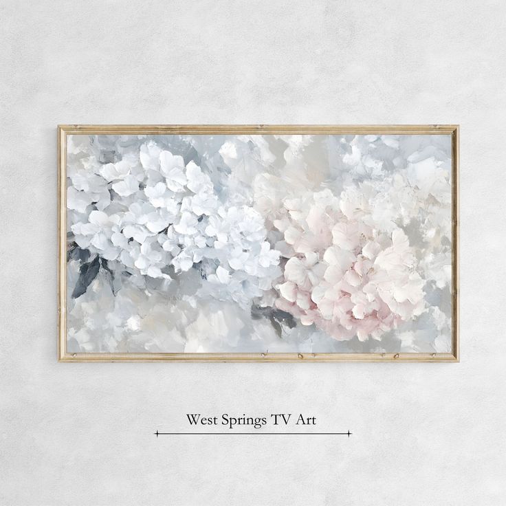 a white and pink floral painting hanging on a wall