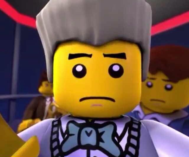 the lego movie character is wearing a white shirt and bow tie with two other characters behind him