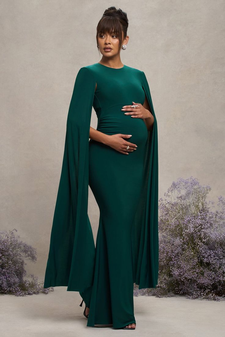 Divine Timing Bottle Green Maternity Maxi Dress With Cape Sleeves – Club L London - USA Formal Dresses Maternity, Green Baby Shower Dress For Mom, Maternity Gala Dress, Pregnant Outfit Wedding Guest, Maternity Cocktail Attire, Elegant Maternity Outfits, Maternity Photo Shoot Dress, Pregnant Dress For Wedding Guest, Maternity Dresses For Wedding Guest