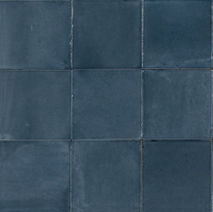 an image of a blue tiled wall