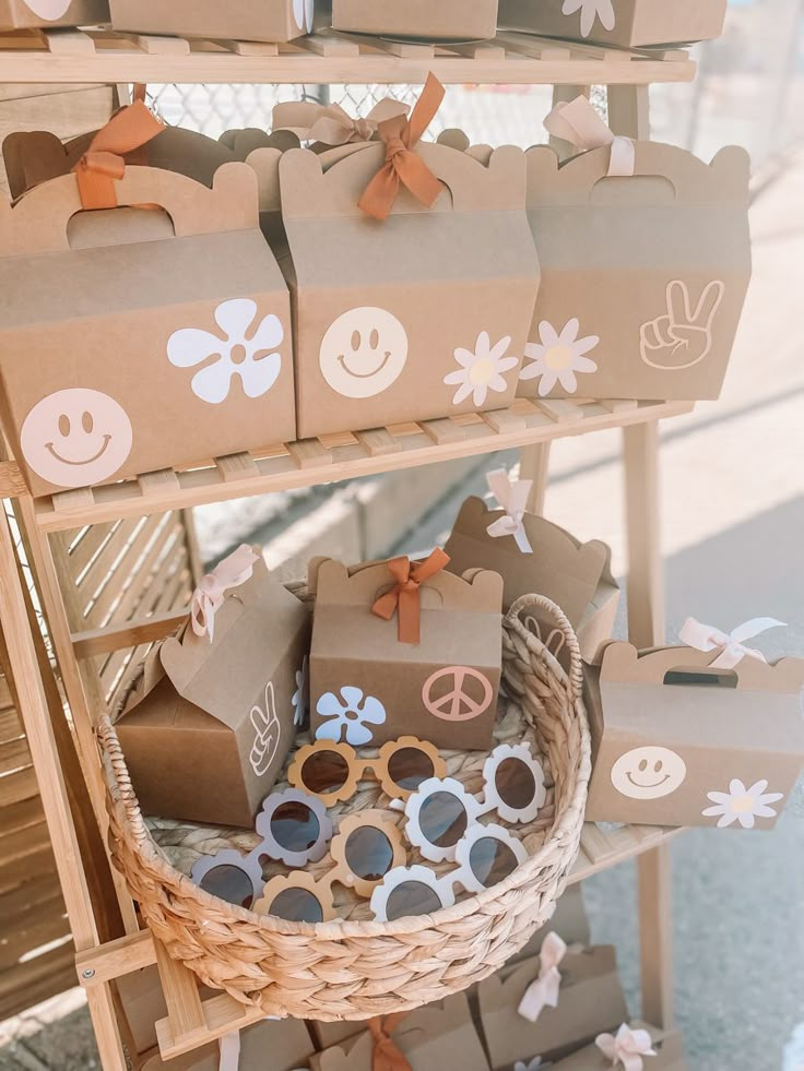 many brown bags with smiley faces on them are sitting in front of a rack full of boxes