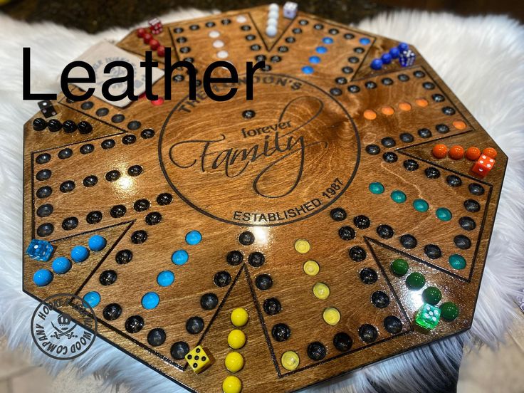 a wooden board game sitting on top of a white furnishing covered floor with the words leather