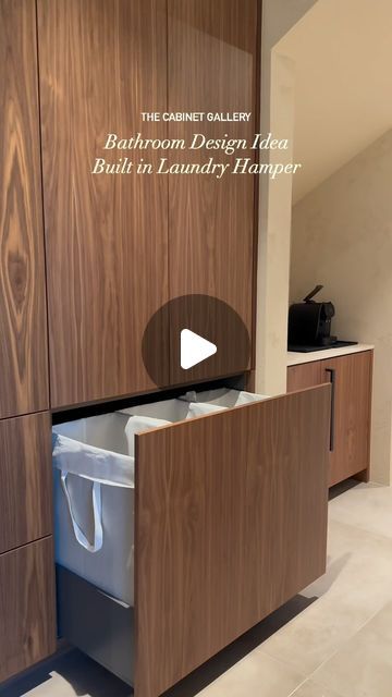 the bathroom design idea built in laundry hamper is featured on this advertiser's website