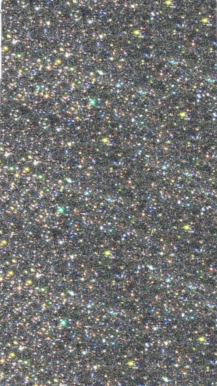 an image of some very pretty glitters on the ground in black and silver colors