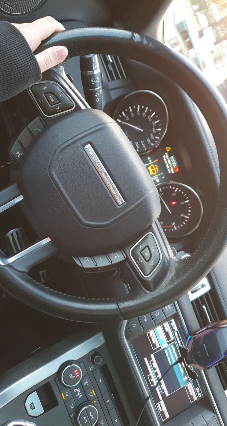 the steering wheel and dashboard of a vehicle