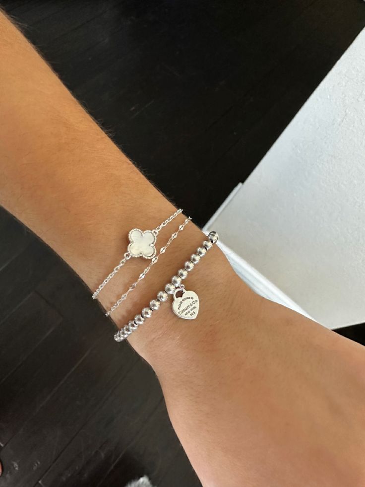 Girl wearing silver luxury bracelet stack. Minimalist Jewelry Silver, Silver Bracelet Stack, Silver Jewlery, Wrist Jewelry, Jewelry Accessories Ideas, Dope Jewelry, Classy Jewelry, Jewelry Essentials, Jewelry Lookbook