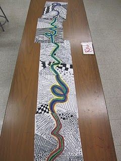 a long table with a very colorful tie on it's end and some writing on the side