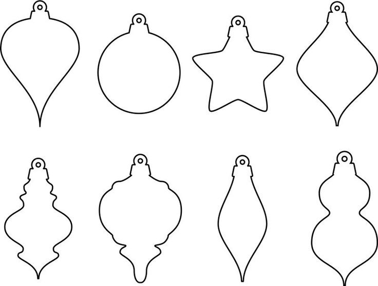 christmas ornaments cut out from paper and placed on a white background with the outlines for each ornament