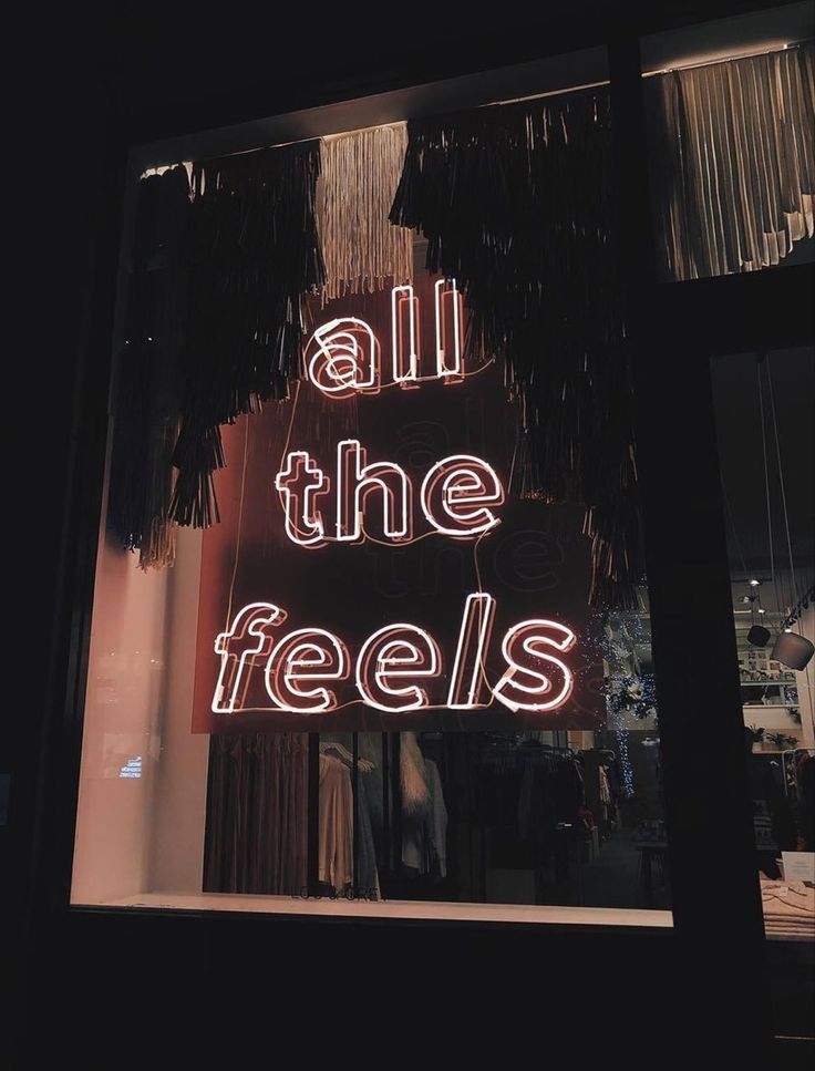 a neon sign that says all the feels