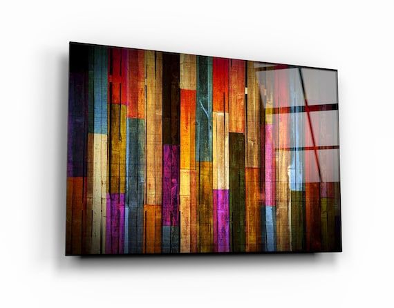 an abstract painting on the wall with different colors