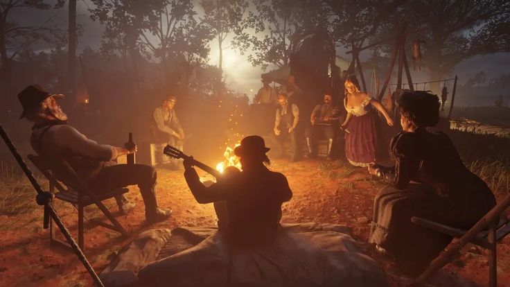 a group of people sitting around a campfire in the woods at night with one person holding a guitar