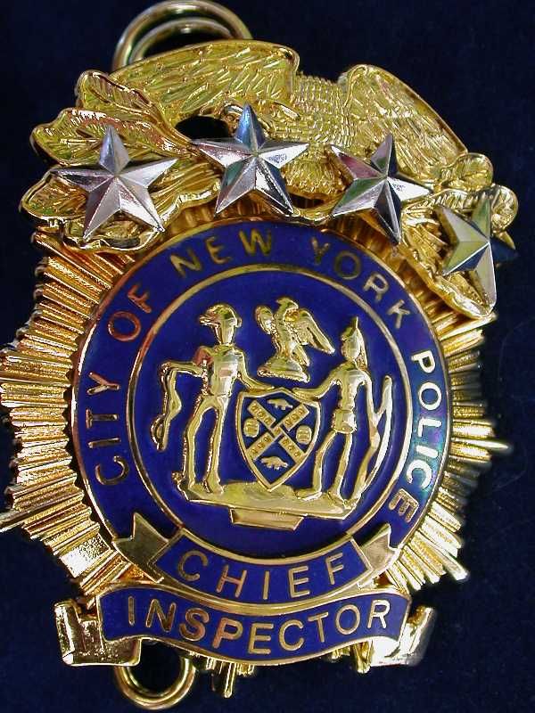 the badge is gold and blue with stars on it