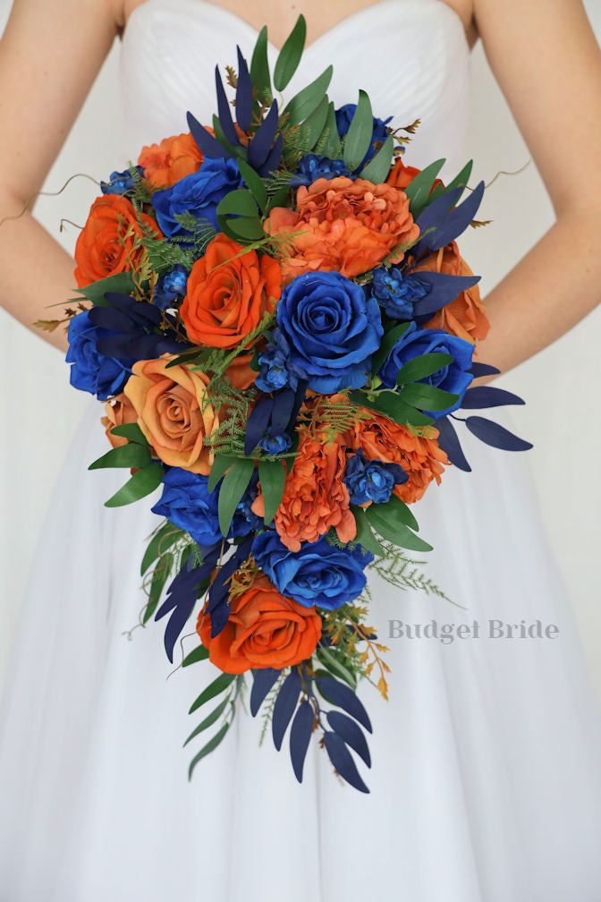 a bridal bouquet with orange and blue flowers