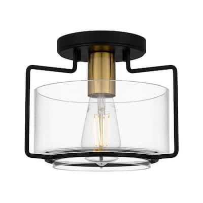 With its mixed metal finishes, this 1-light flush mount from Hampton Bay embodies modern industrial styling. Sleek matte black lines surround a clear glass shade for a unique, geometric outline. Gold accents complete the look, adding a hint of retro shine. Black And Gold Ceiling Light, Black And Gold Flush Mount Light Fixture, Black And Gold Flush Mount Light, Black And Gold Semi Flush Mount Light, Matte Black Flush Mount Light, Light Window Treatments, Black Sunburst Flush Ceiling Light Fixture, Parisian Decor, Interior Lighting Ceiling